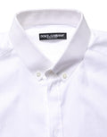 Chemise blanche à manches courtes en coton Dolce & Gabbana avec boutons, vue de face sur fond blanc.
