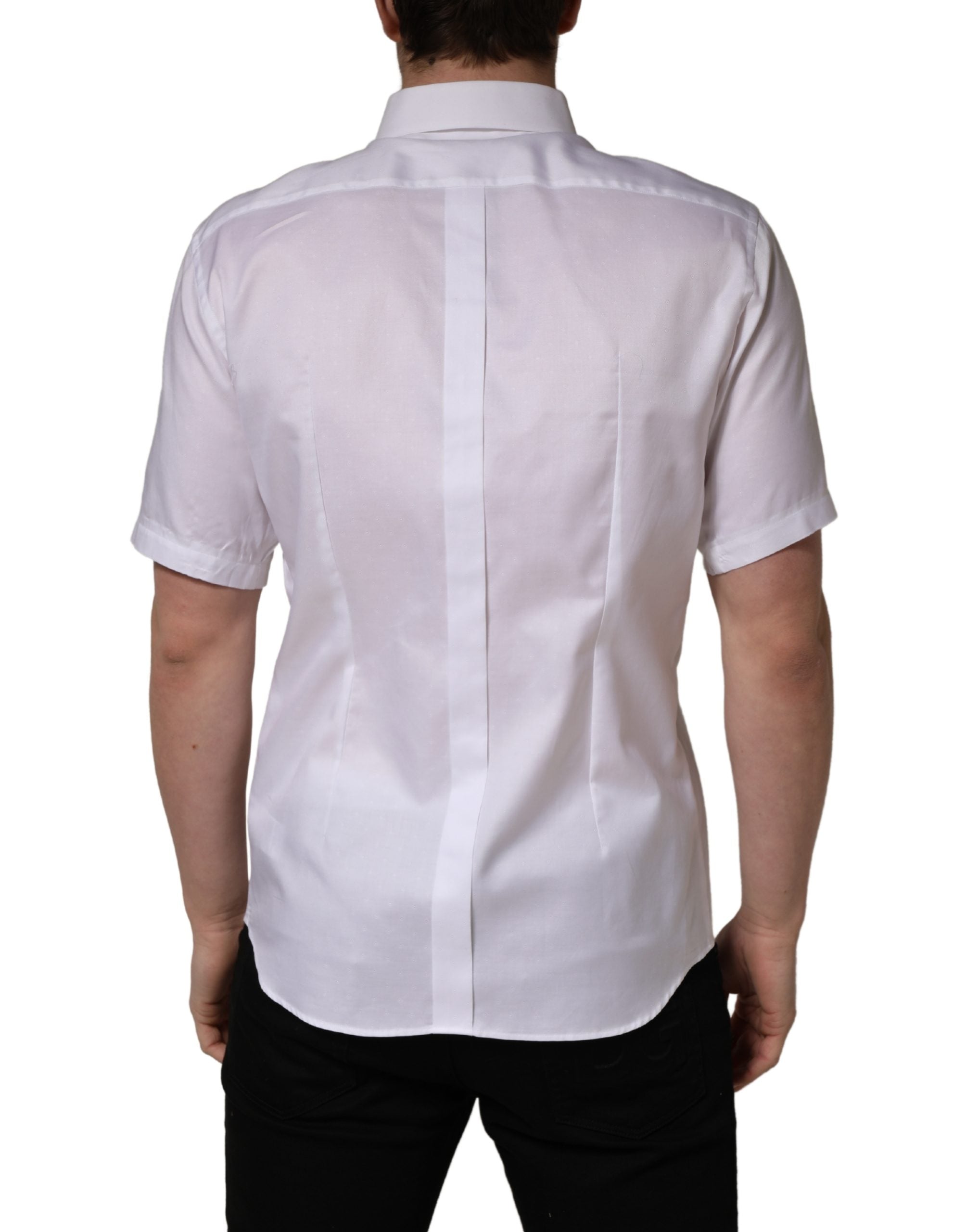Chemise blanche en coton à manches courtes de Dolce & Gabbana, avec col boutonné et coupe élégante.
