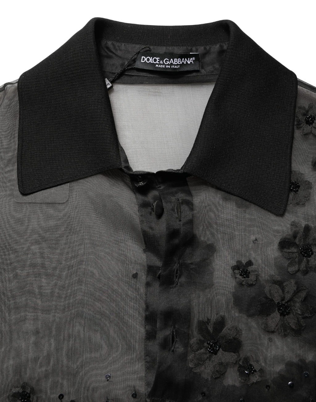 Chemise courte en dentelle noire Dolce & Gabbana avec appliqué floral transparent à manches courtes.