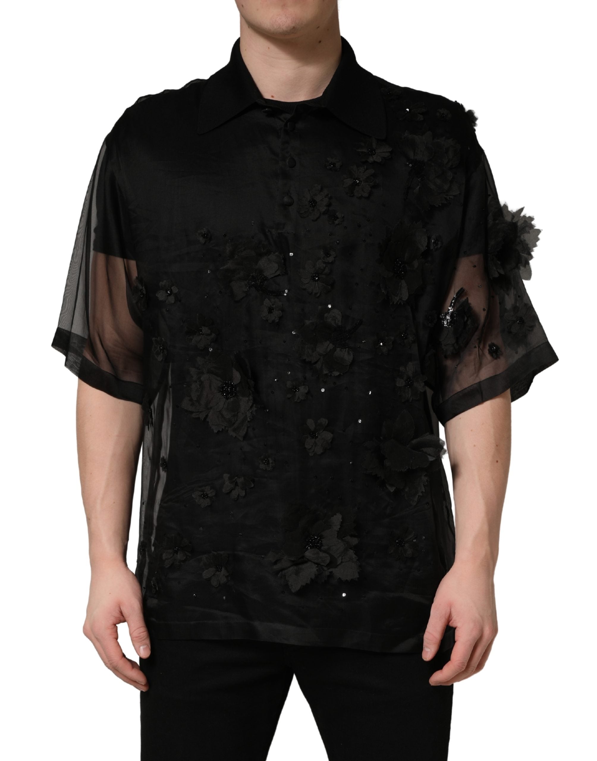 Chemise transparente à manches courtes Dolce & Gabbana avec appliqué floral noir, style élégant et sophistiqué.