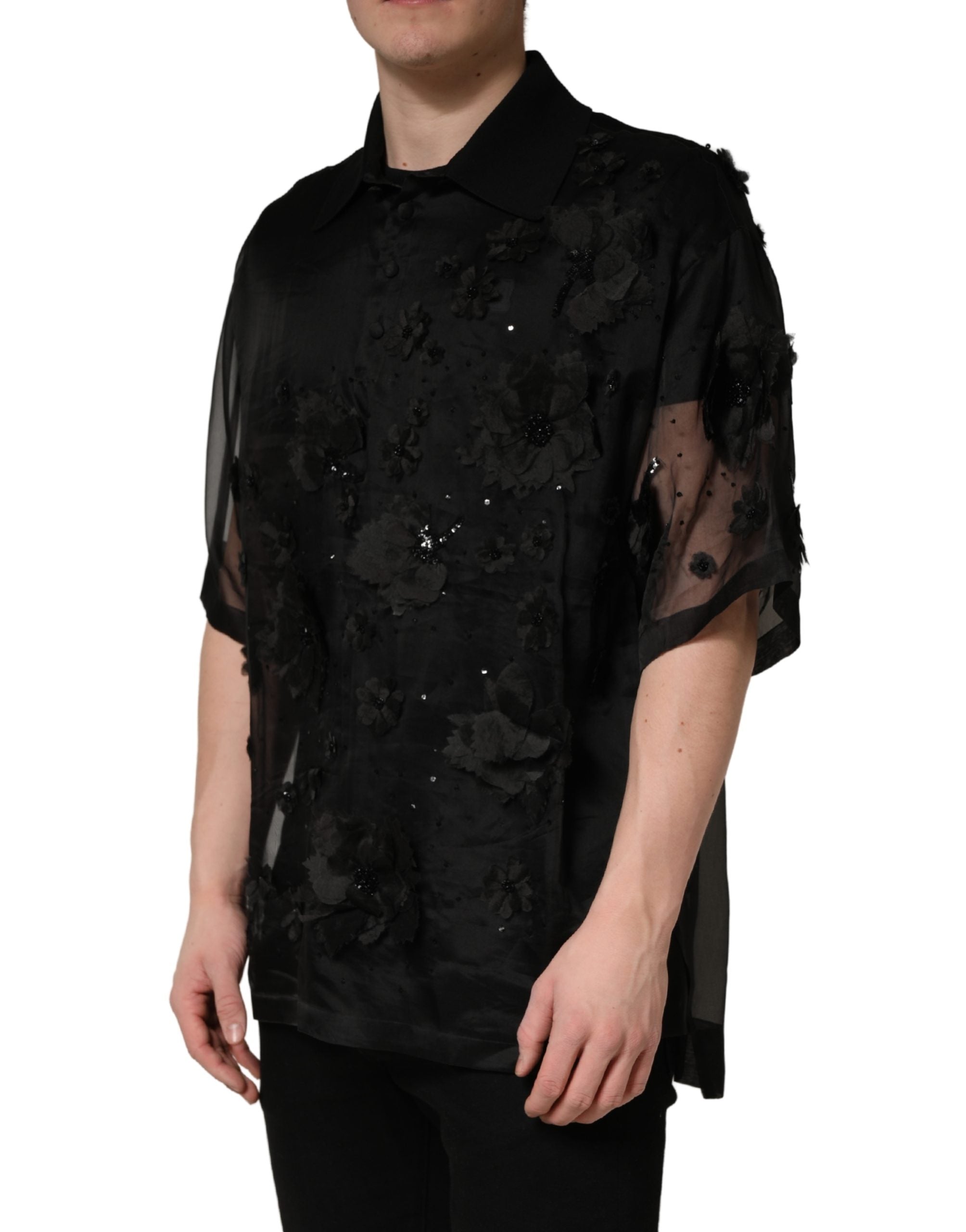 Chemise transparente à manches courtes Dolce & Gabbana avec appliqué floral noir, design élégant et sophistiqué.