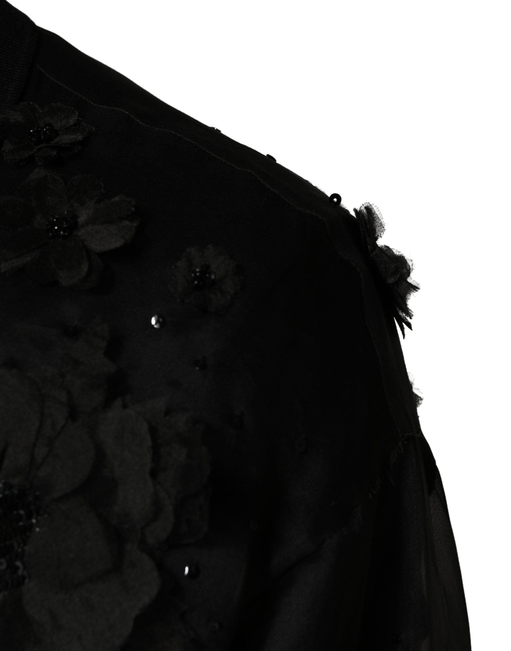Chemise transparente à manches courtes Dolce & Gabbana avec appliqué floral noir, style élégant et sophistiqué.