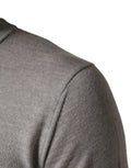 Pull-over gris à manches longues Dolce & Gabbana, col rond, en maille douce et élégante.