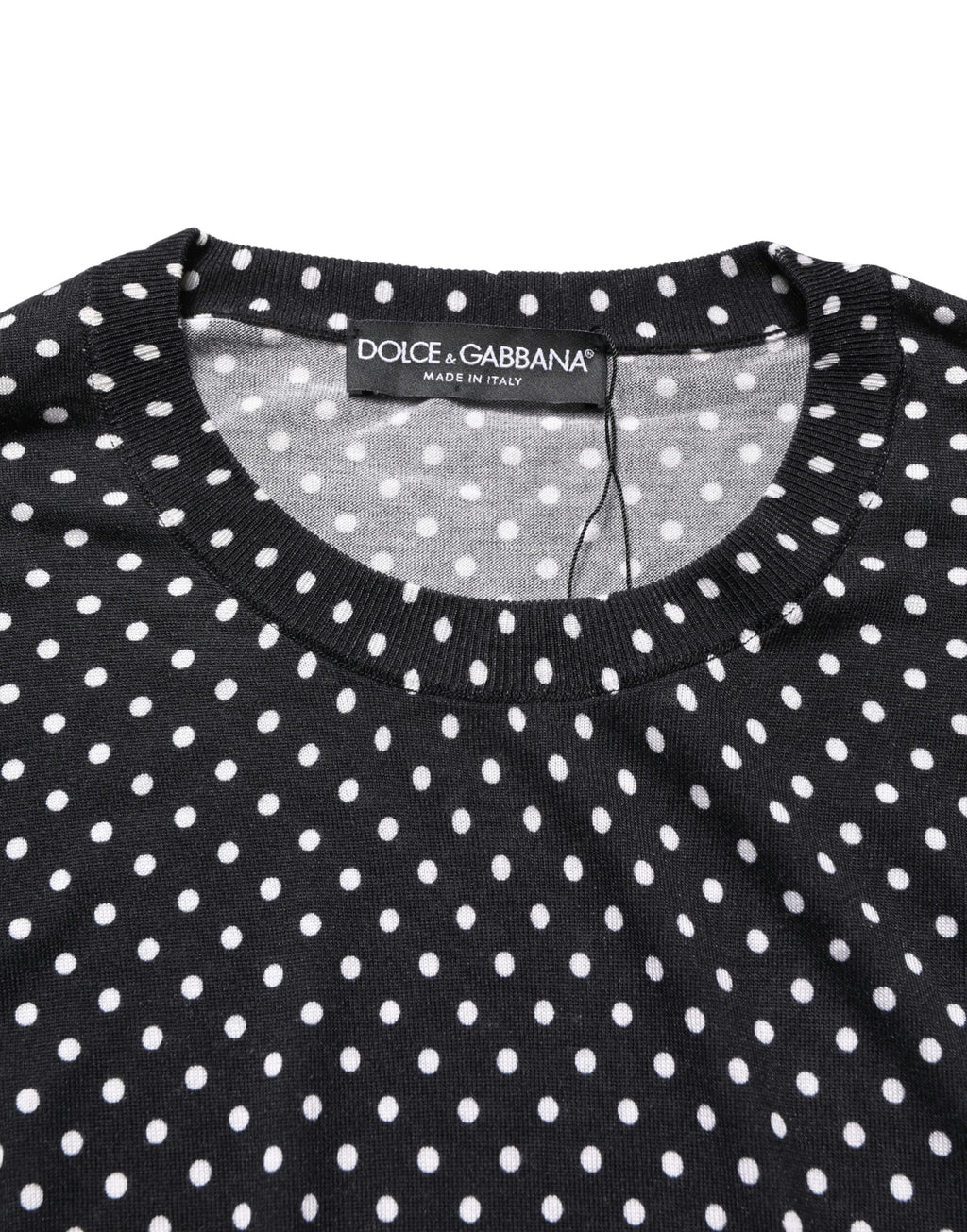 Pull à col rond noir à pois blancs de Dolce & Gabbana, pull-over en maille avec motif à pois, style élégant et classique.