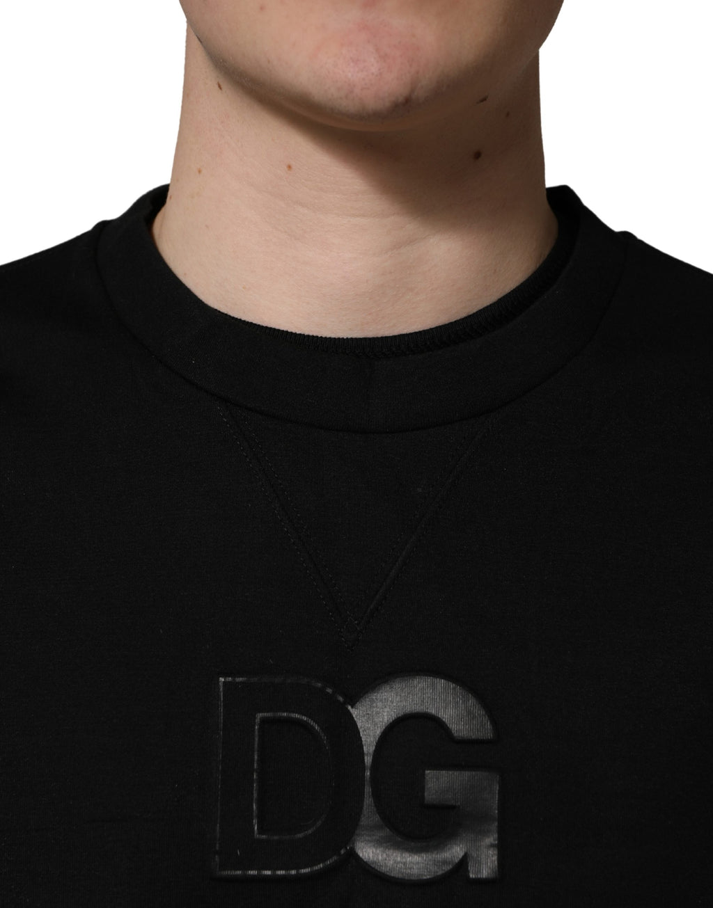 Pull à manches longues noir en coton Dolce & Gabbana pour homme, col rond, style élégant et confortable.