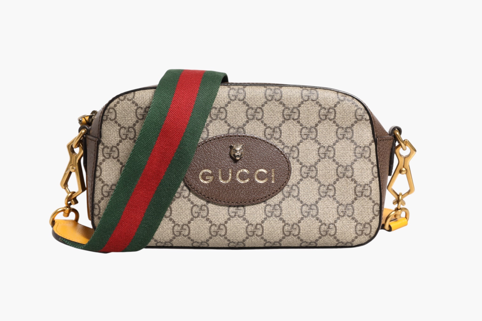 Sac à messenger Gucci GG Supreme en toile enduite, design élégant avec logo emblématique et bandoulière réglable.