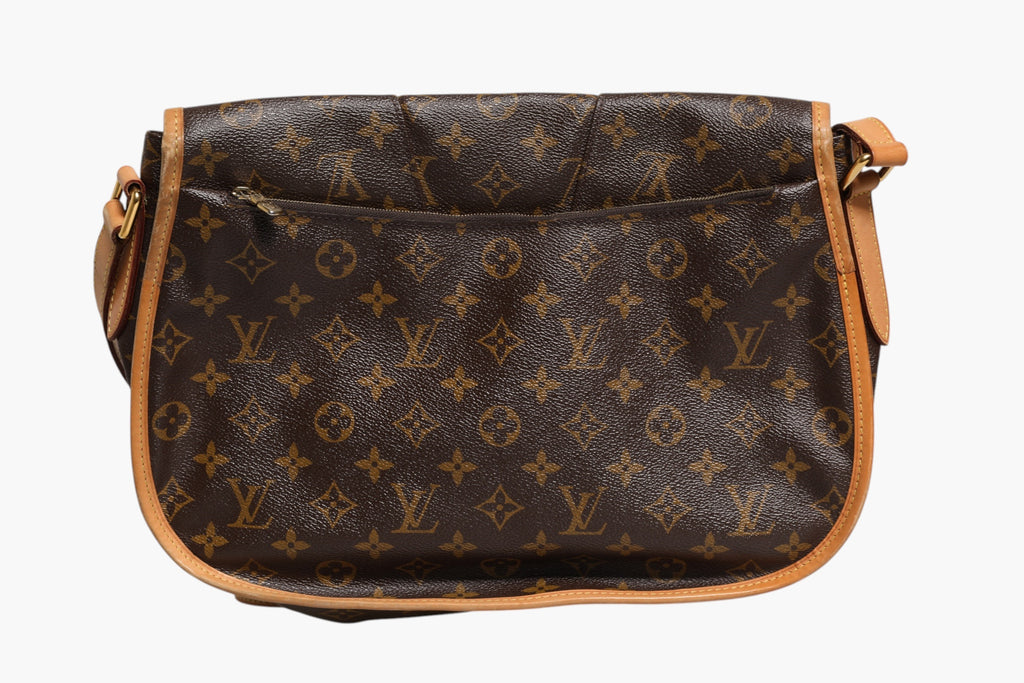 Sac Louis Vuitton Monogram Canvas Menilmontant MM avec bandoulière en cuir et détails emblématiques Louis Vuitton.