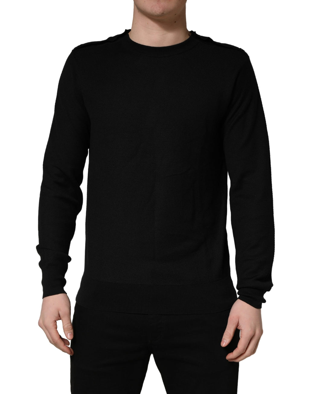 Pull à manches longues noir Dolce & Gabbana à col rond, en laine douce, porté sur un mannequin.