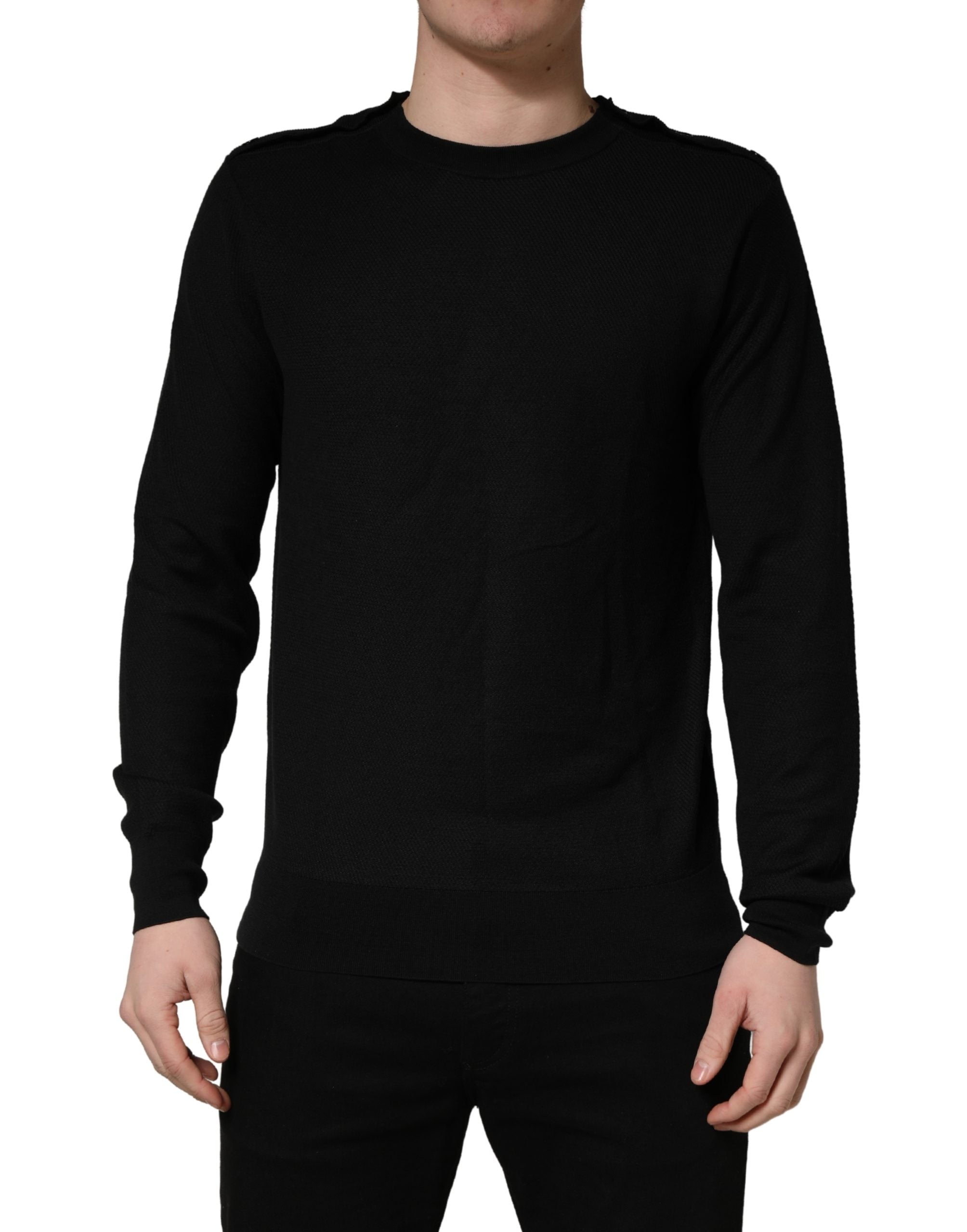 Pull à manches longues noir Dolce & Gabbana à col rond, en laine douce, porté sur un mannequin.