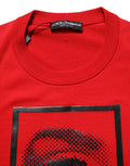 Pull à col rond Dolce & Gabbana rouge avec motif d'yeux, pull-over en maille élégant et tendance.