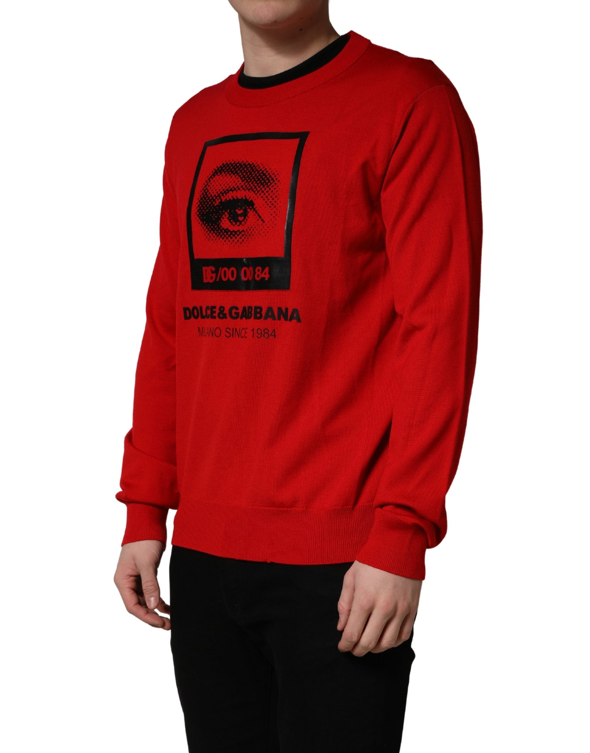 Pull à col rond Dolce & Gabbana rouge avec motif œil imprimé, sweater confortable en maille pour homme.