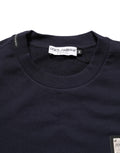 Sweatshirt en jersey noir Dolce & Gabbana avec plaque logo en coton, style décontracté et élégant.