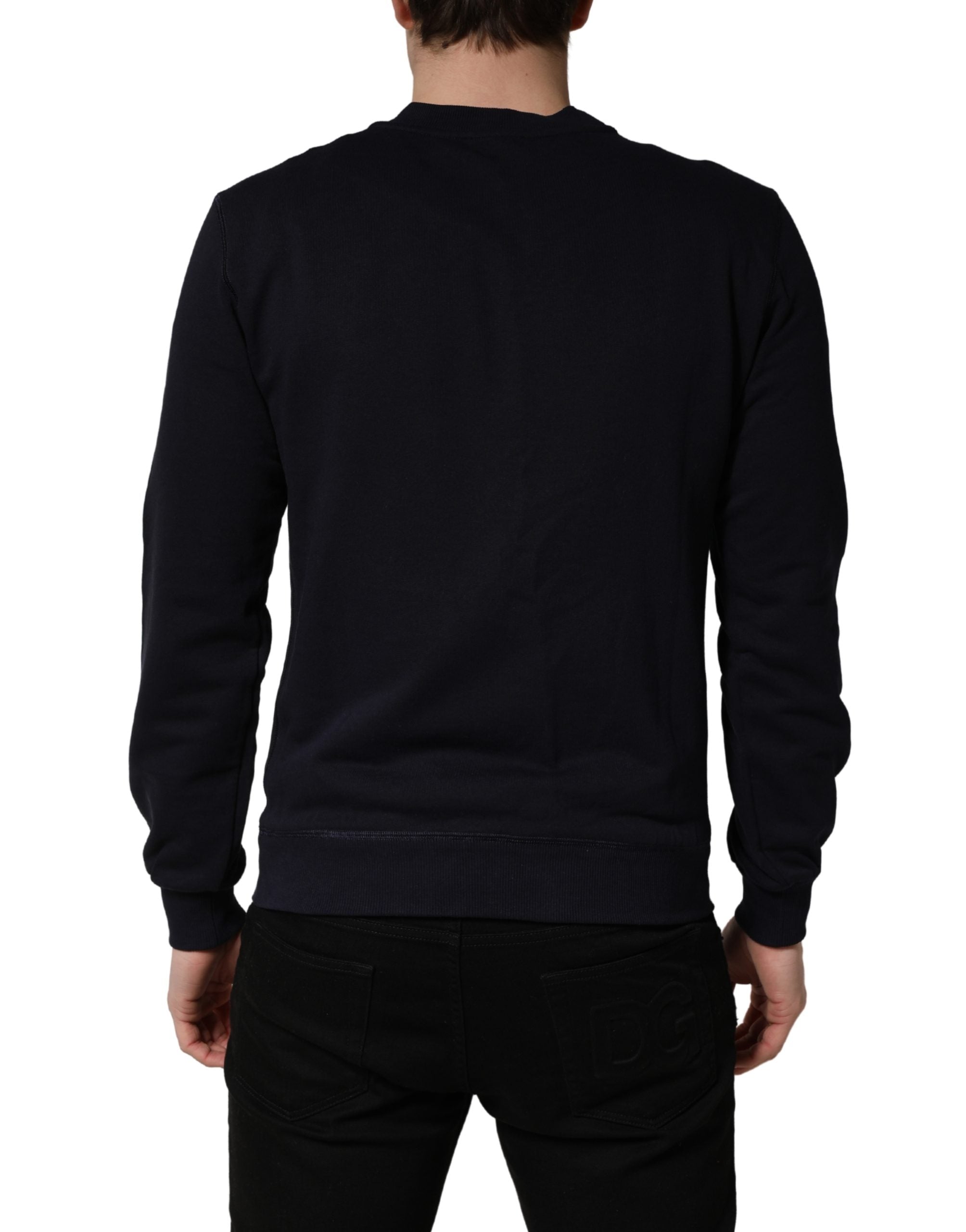 Sweatshirt en jersey noir Dolce & Gabbana avec plaque logo en coton, style décontracté et élégant, vue de face.