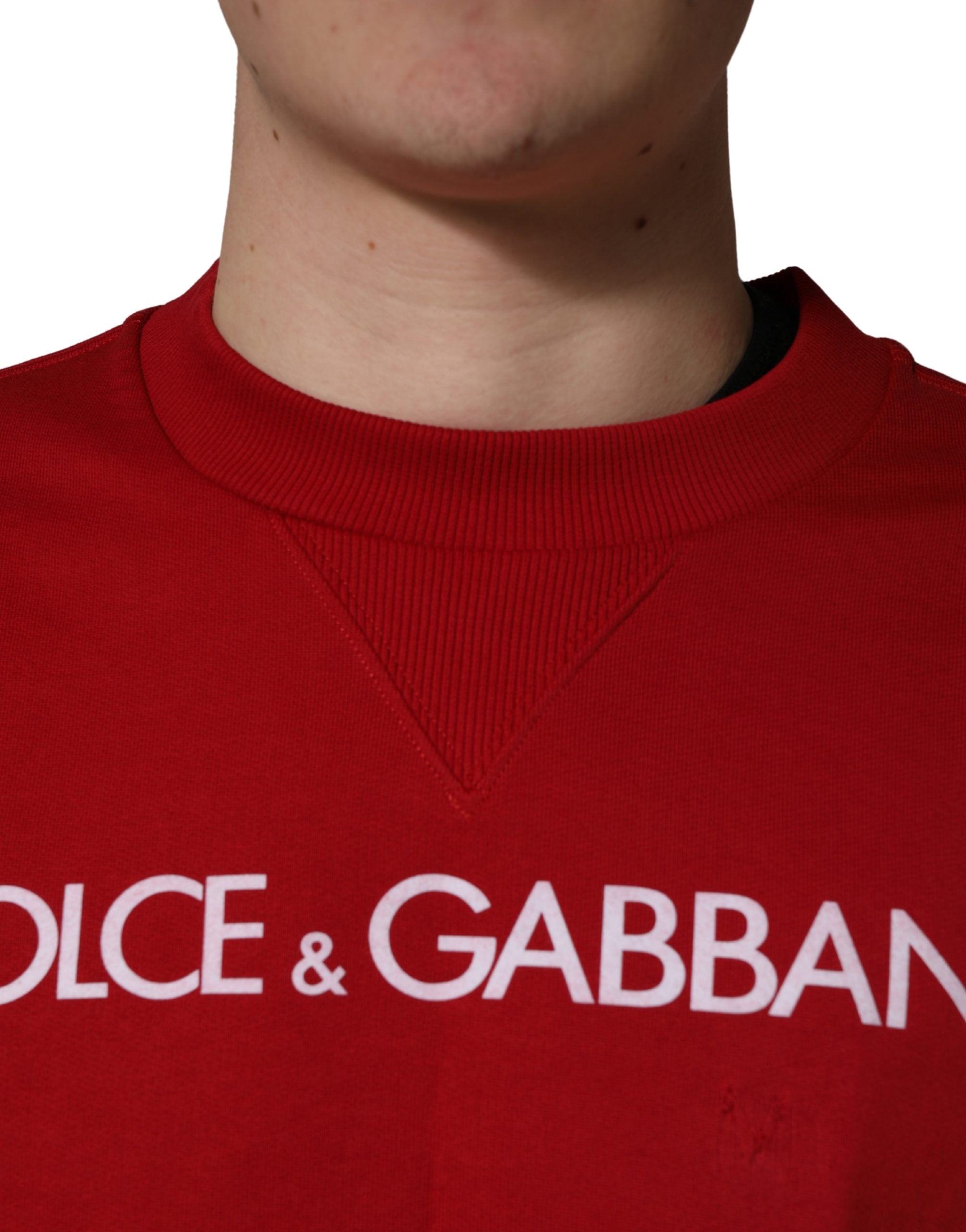Sweatshirt Dolce & Gabbana en coton rouge avec logo DG, style jersey et col rond, vue de face.
