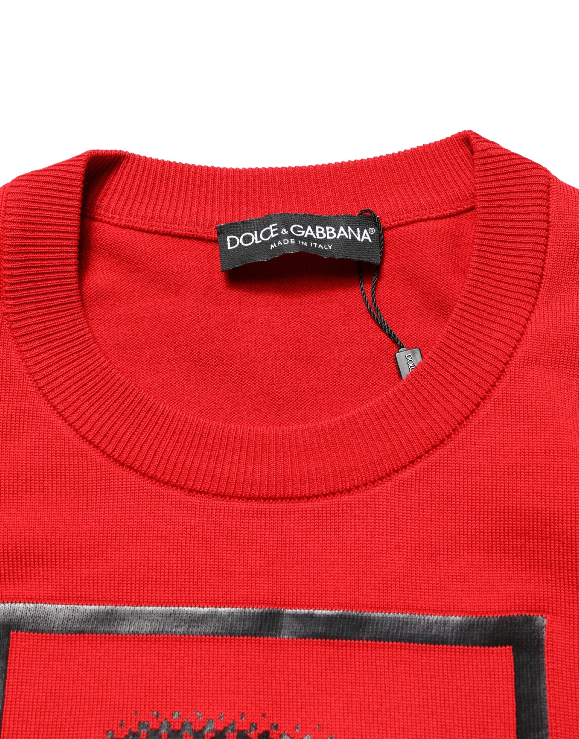 Pull noir Dolce & Gabbana à print œil rouge, col rond, en coton, visible en gros plan.
