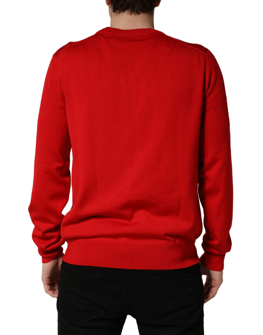 Pull à manches longues Dolce & Gabbana rouge avec motif d'yeux imprimé, col rond, style décontracté et tendance.