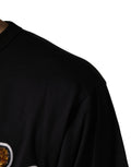 T-shirt en coton noir Dolce & Gabbana avec un imprimé d'ange et un col rond, mode élégante et confortable.