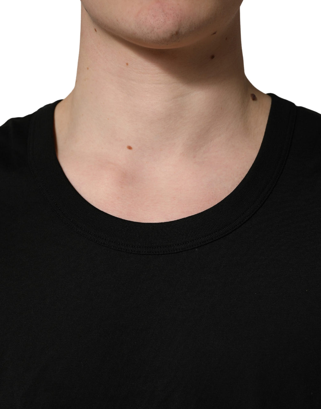 Débardeur homme sans manches en coton noir de Dolce & Gabbana, élégant et confortable, prêt à être porté.