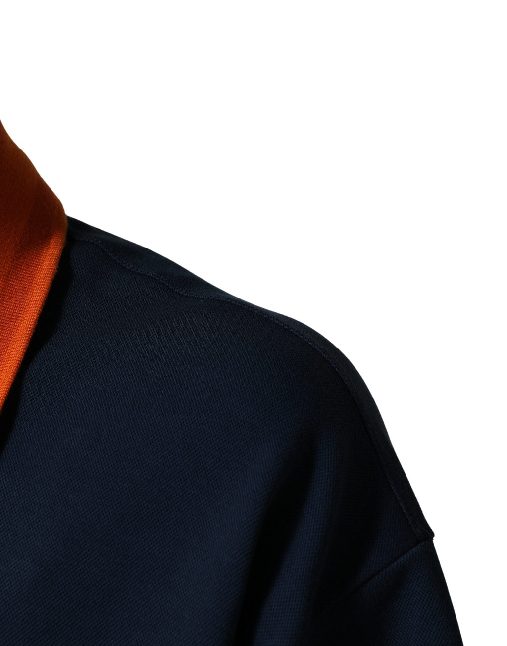 Polo homme Dolce & Gabbana en coton bleu marine, logo sur la poitrine, manches courtes, style élégant et décontracté.
