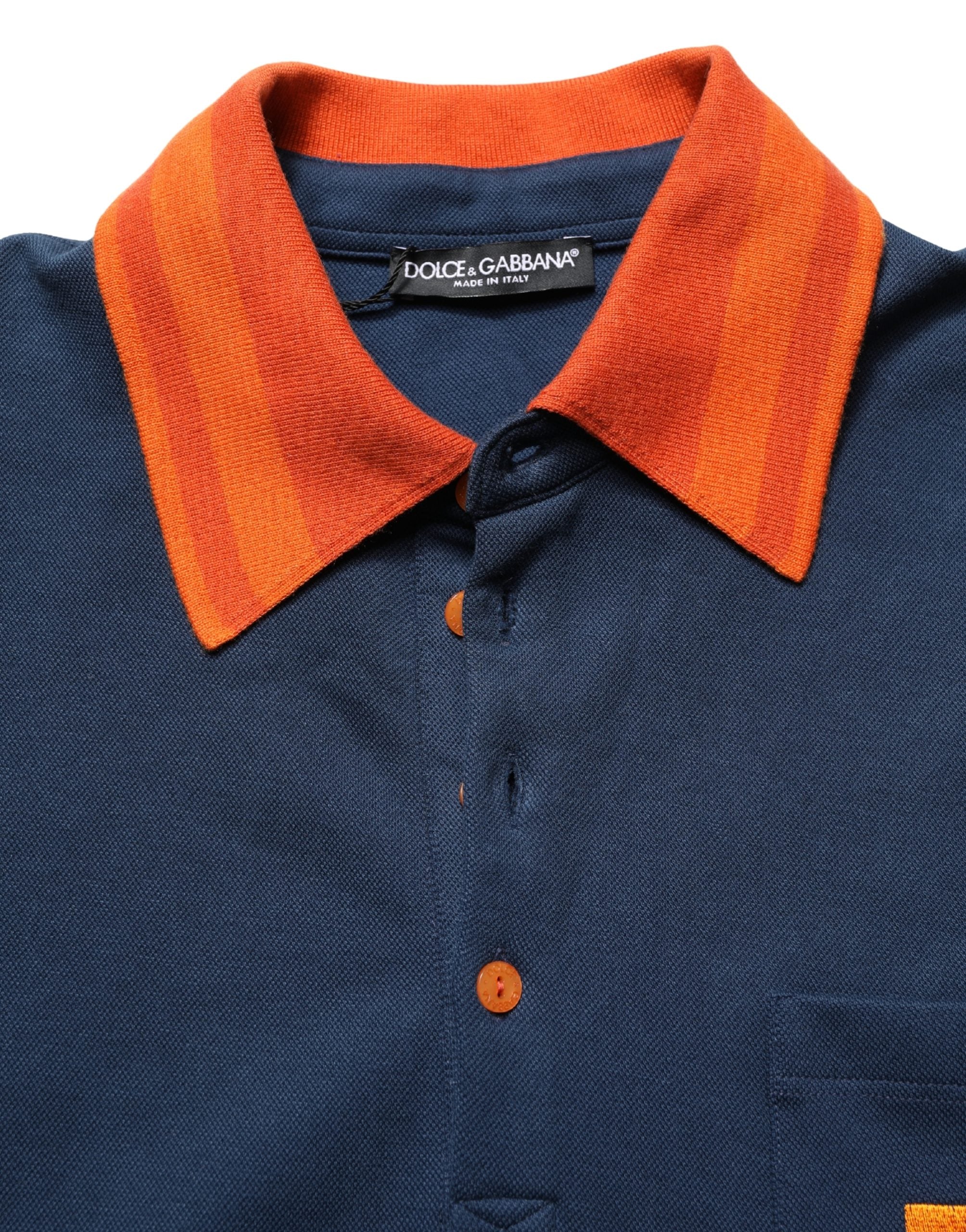 Polo homme Dolce & Gabbana en coton bleu marine avec logo, manches courtes et design élégant.