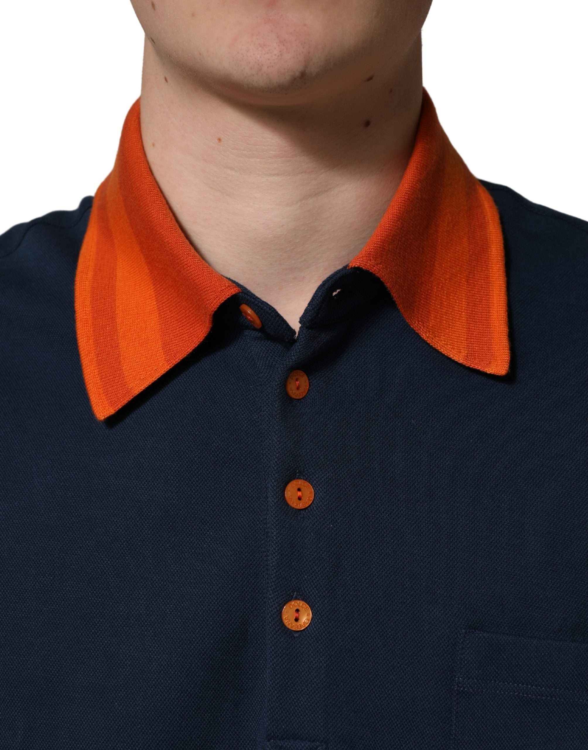 Polo homme Dolce & Gabbana en coton bleu marine avec logo, manches courtes et style classique.