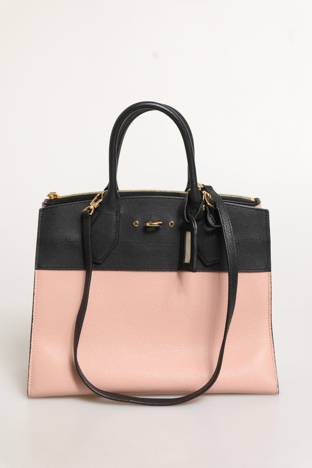 Sac à main Louis Vuitton City Steamer en cuir rose et noir, élégant et spacieux avec détails en cuir de haute qualité.