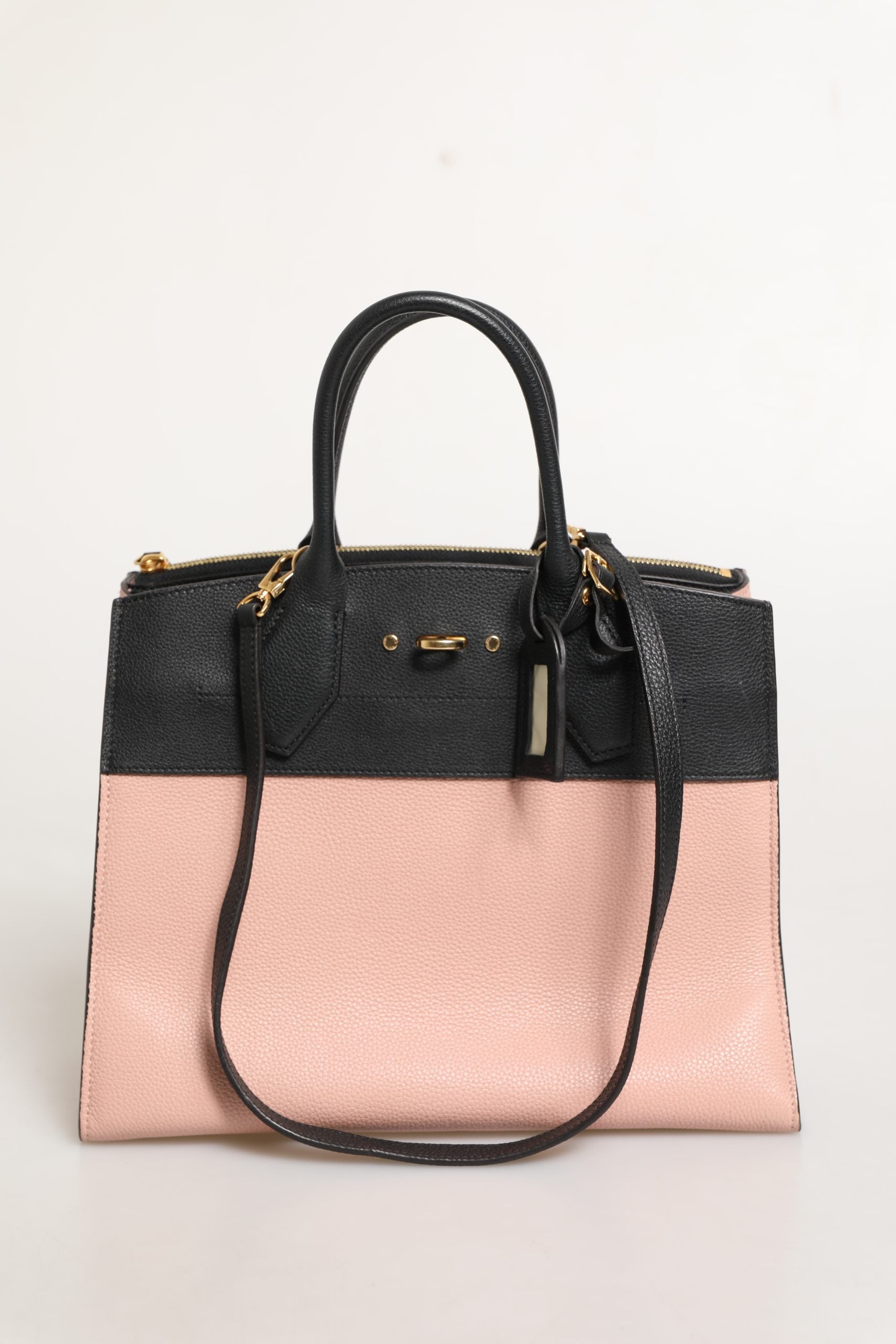 Sac à main Louis Vuitton City Steamer en cuir rose et noir, élégant et spacieux avec détails en cuir de haute qualité.