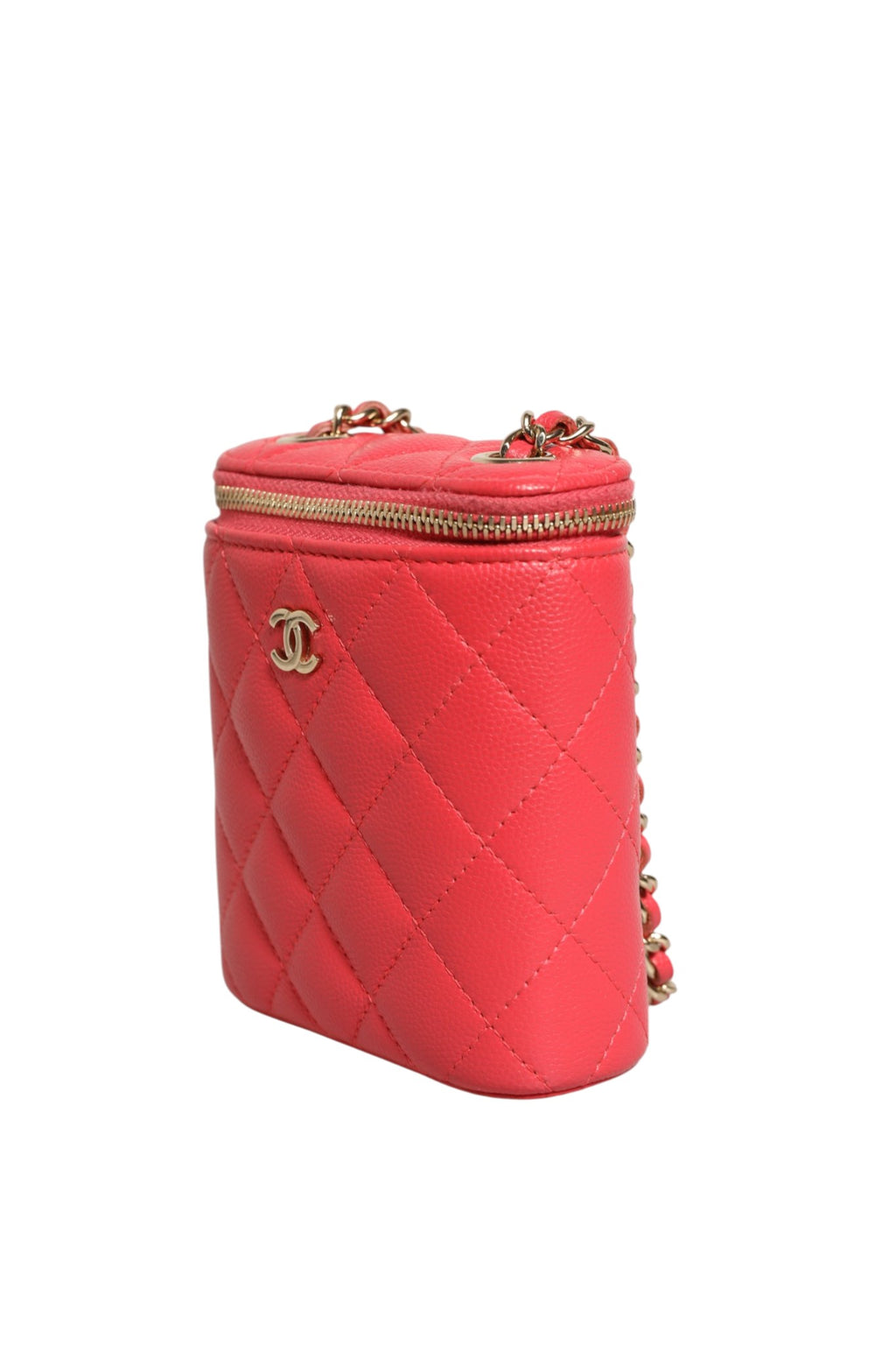 Petite trousse de beauté Chanel en caviar rouge avec motif matelassé vertical et chaîne, idéale pour accessoires.