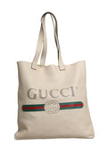 Sac tote Gucci blanc avec logo Sherry Web, motif imprimé, grandes poignées en toile et design élégant.