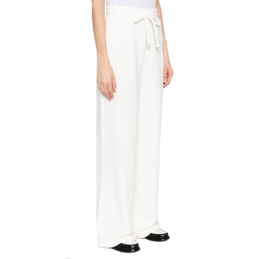 Pantalons de jogging en coton blanc Gucci pour homme, style décontracté et confortable avec logo Gucci visible.