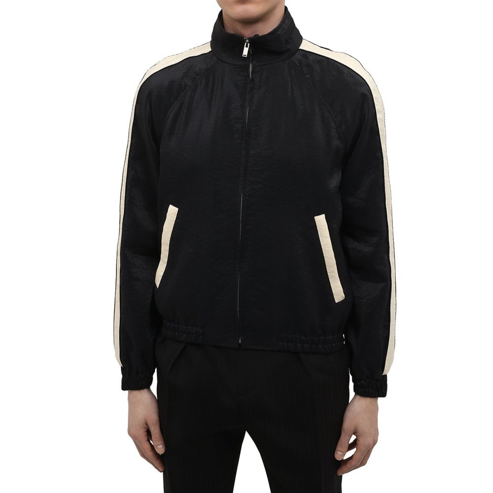 Veste bomber noire en polyamide de Saint Laurent, avec design élégant et détails modernes, vue de face sur fond blanc.