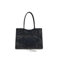 Sac à épaules Balenciaga en cuir d'agneau noir avec détails en peau d'ovin, élégant et tendance.