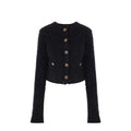 Cardigan en coton noir Balenciaga, vêtement homme ou femme, avec détails de texture visible sur l'image.