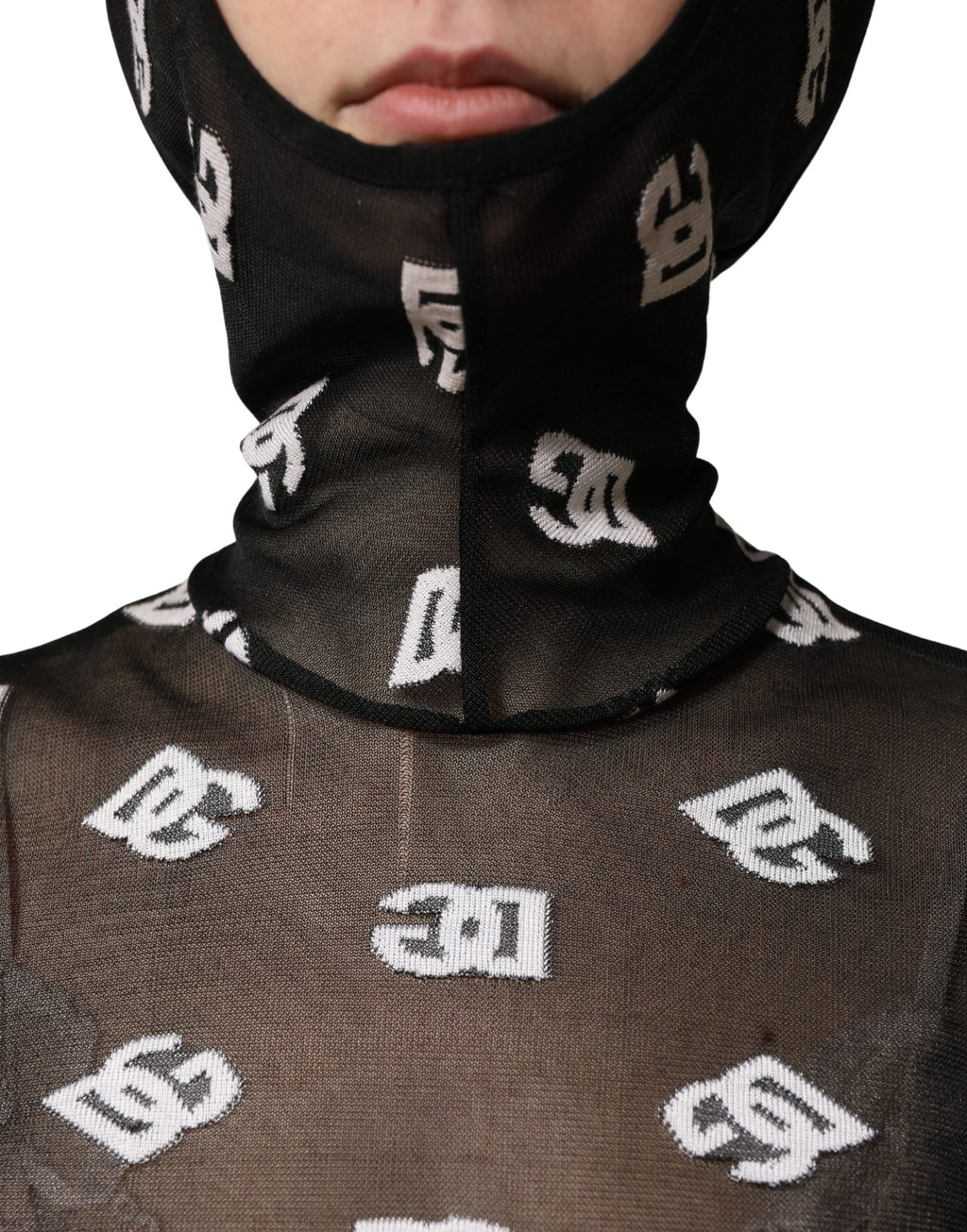Combinaison à capuche Dolce & Gabbana noire et blanche avec logo imprimé, style décontracté et tendance.