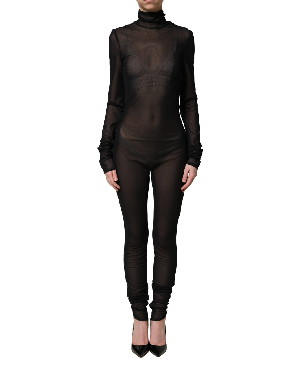 Combinaison noire en nylon transparent avec col roulé de Dolce & Gabbana, élégante et ajustée, portée comme robe ou combinaison chic.
