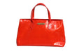 Sac Louis Vuitton Wilshire PM en monogramme Vernis rouge, avec poignées en cuir et fermeture métallique, élégant et sophistiqué.