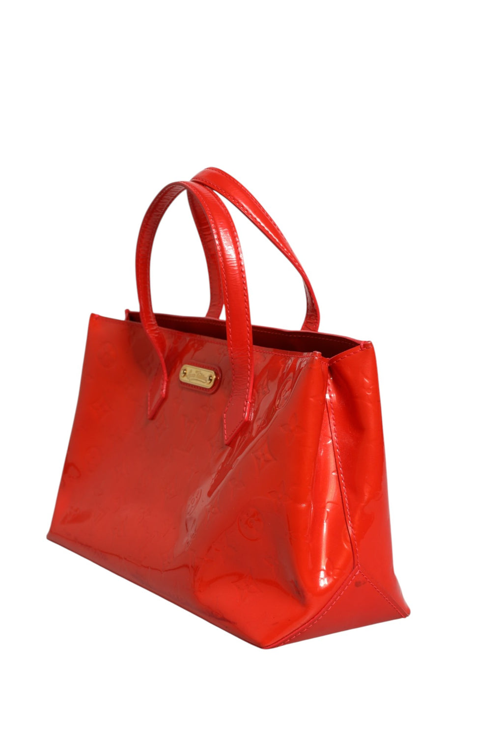 Sac Louis Vuitton Wilshire PM en vernis rouge à monogramme, élégant et brillant, avec détails en cuir et logo Louis Vuitton visible.
