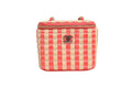 Mini vanity case Chanel en jute rayée en raffia, élégante pochette de maquillage compacte avec rayures noires et naturelles.