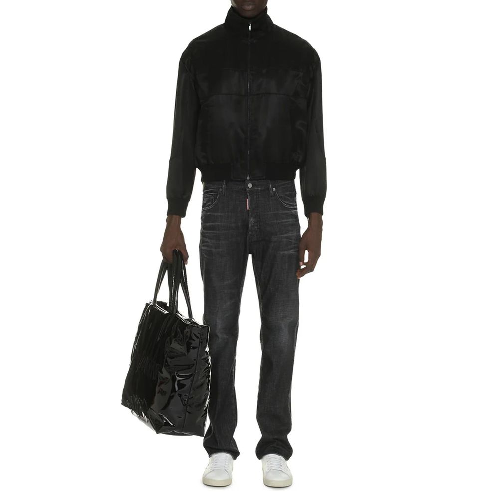 Veste en soie noire Saint Laurent, élégante et sophistiquée, avec coupe ajustée et détails raffinés visible sur l'image.