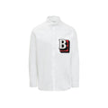 Chemise blanche en coton Burberry, costume élégant pour homme, avec col classique et boutons visibles.