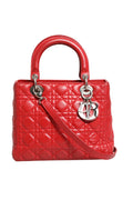 Sac à main Christian Dior Lady Dior en cuir d'agneau rouge avec motif Cannage, élégant et sophistiqué.