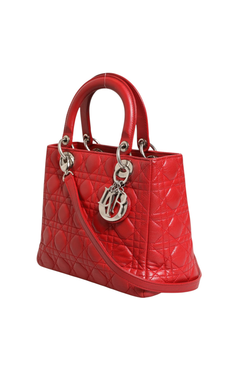 Sac à main Christian Dior Lady Dior en cuir d'agneau rouge avec motif Cannage, élégant et sophistiqué.