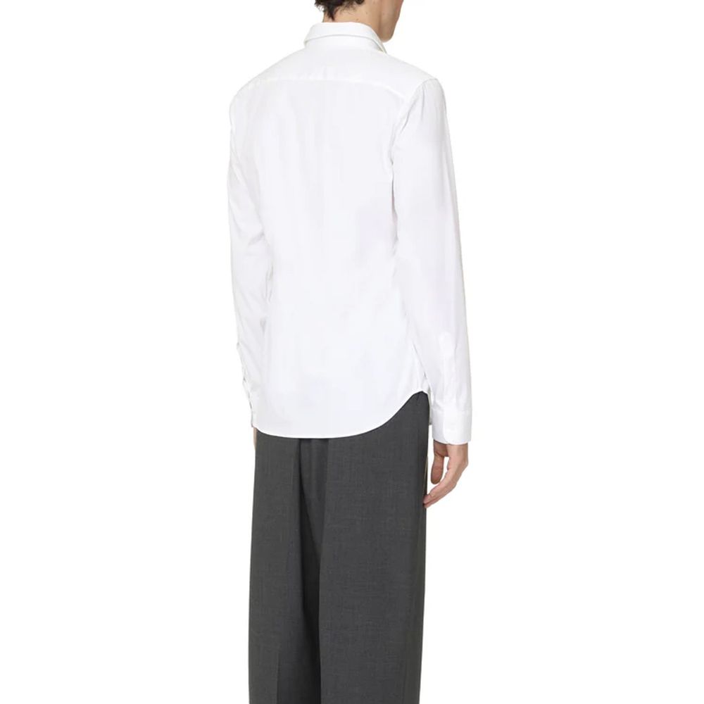 Chemise blanche en coton de Gucci, chemise élégante avec col classique et boutons visibles, vue de face.