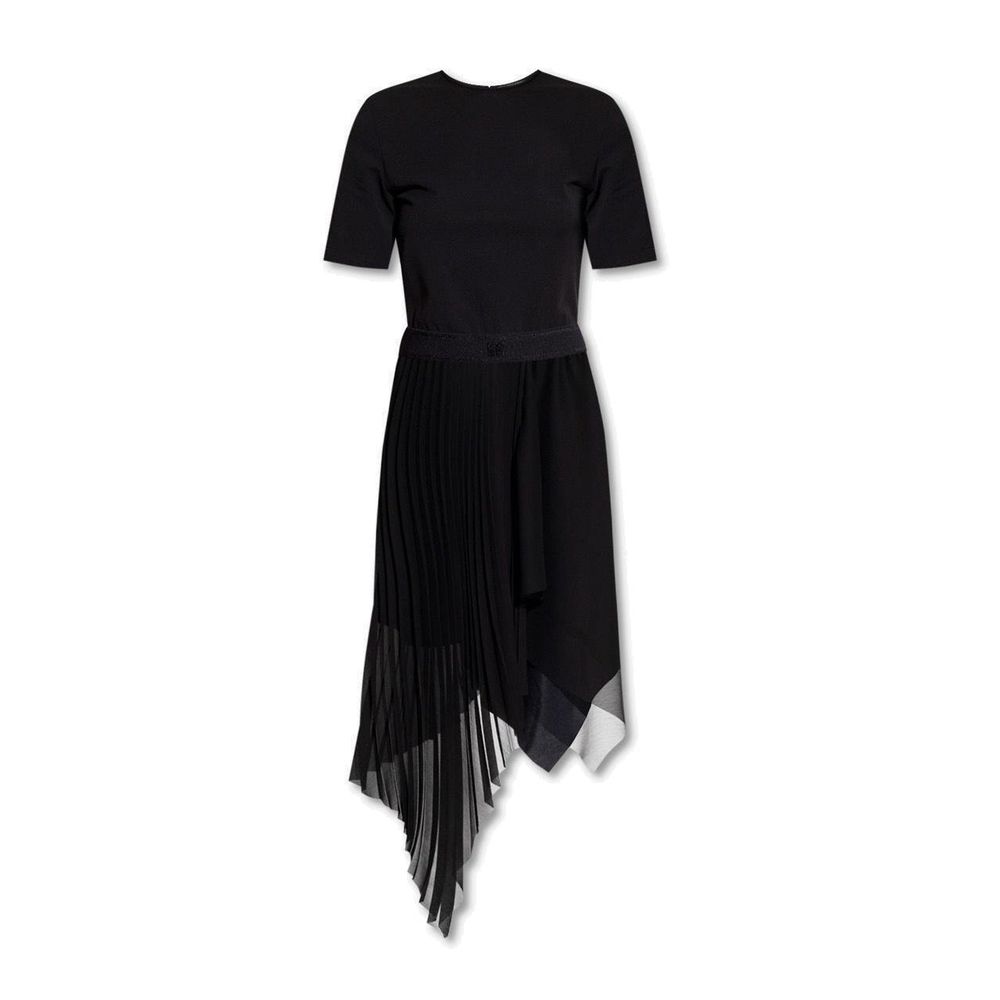 Robe décontractée en polyester noir de Givenchy, coupe élégante et style casual, portée avec accessoires sophistiqués.