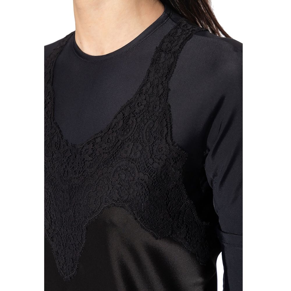 Robe décontractée noire en acétate de la marque Balenciaga, vue de face, avec design élégant et tissu fluide.