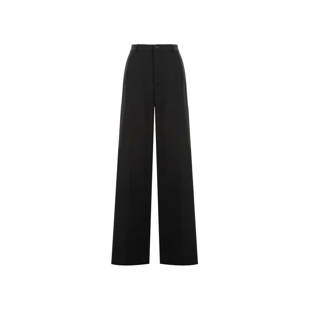 Pantalons évasés en laine noire de Balenciaga, coupe fluide et élégante, affichés sur un mannequin.