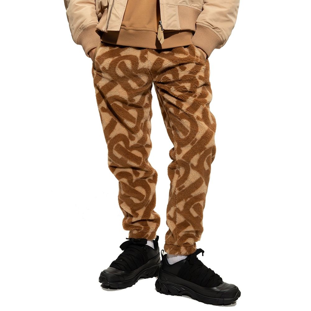 Pantalon décontracté en polyester marron de Burberry, coupe confortable et style élégant, visible sur l'image.