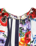 Robe courte en coton popeline à patchworks multicolores de Dolce & Gabbana, style élégant et coloré.