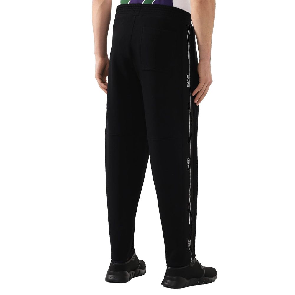 Pantalons de jogging noirs Givenchy en coton pour entraînement, style décontracté avec logo brodé sur la jambe.