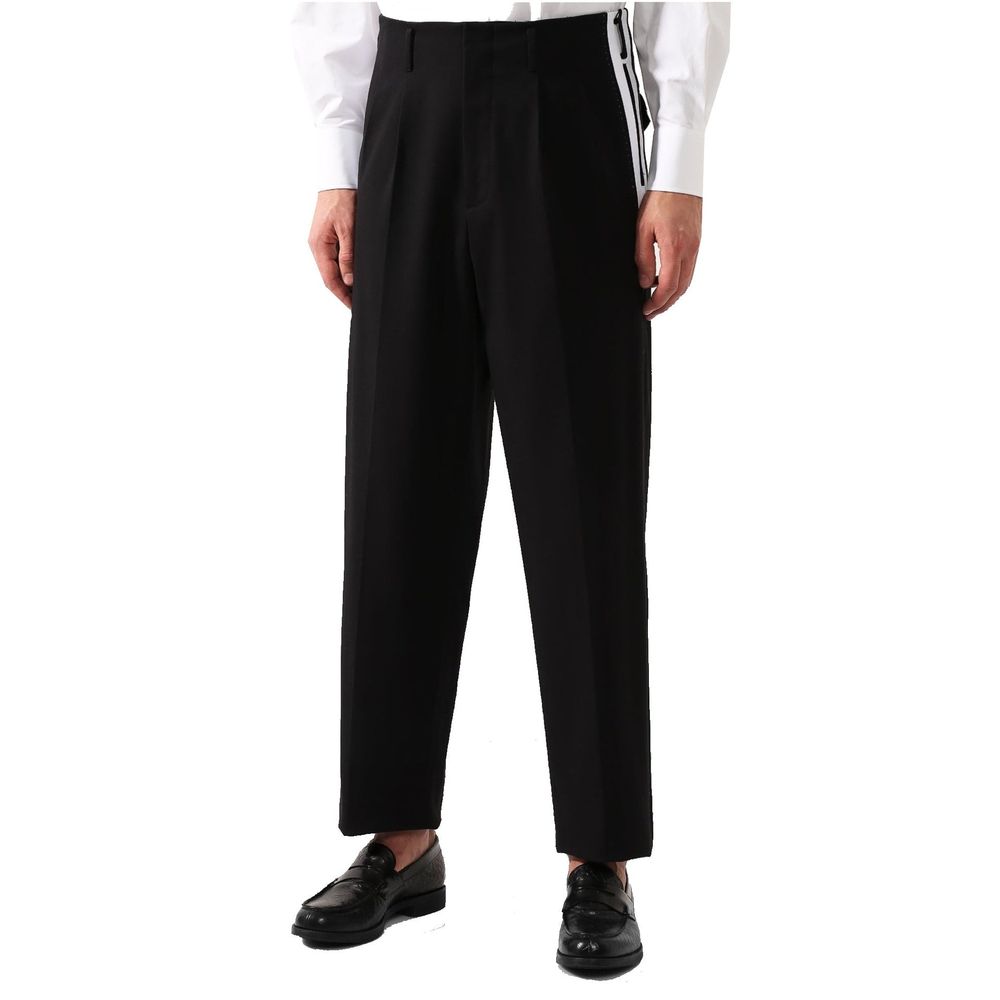 Pantalons en coton noir Dolce & Gabbana pour homme, coupe classique et détails élégants visibles sur l'image.
